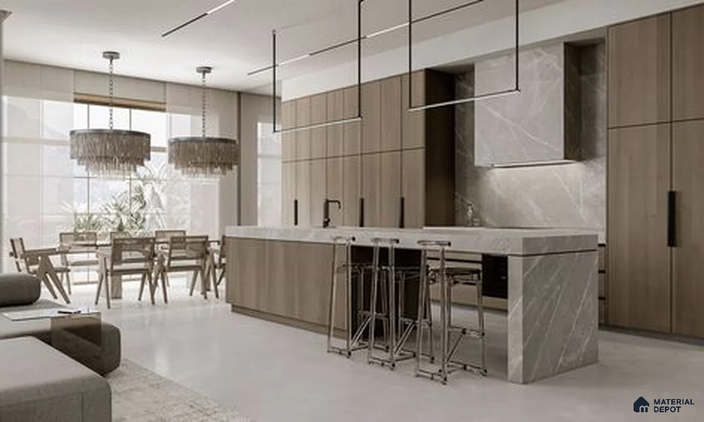 a kitchen with marble counter tops and wooden cabinetry, along with an island in the middle of the middle of the island with stairs leading to shop & more counter top space to an island in the middle of